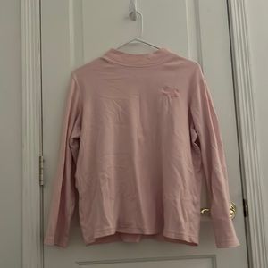 pink turtleneck